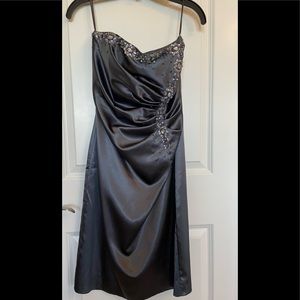 Brand new without tags, Le Chateau strapless dress. Size small.
